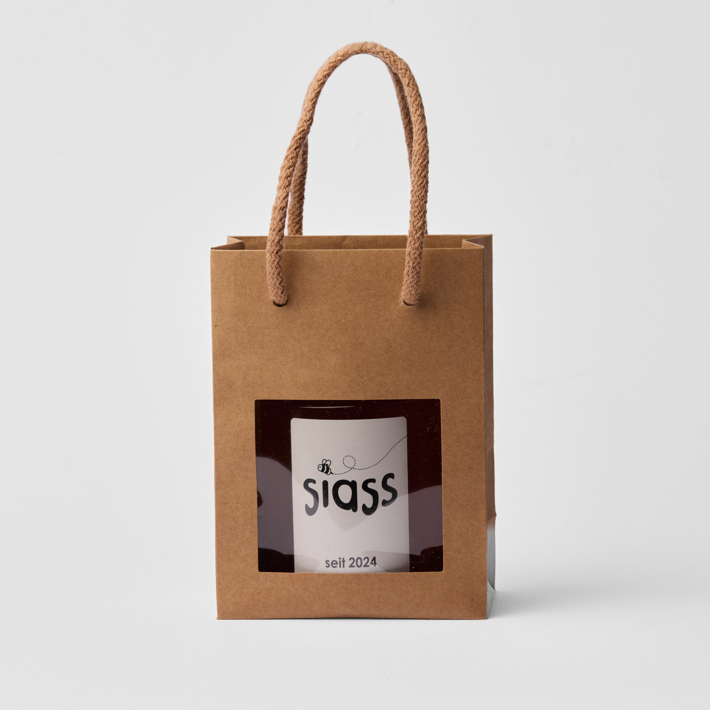Siass Produktfoto mit brauner Tragetasche